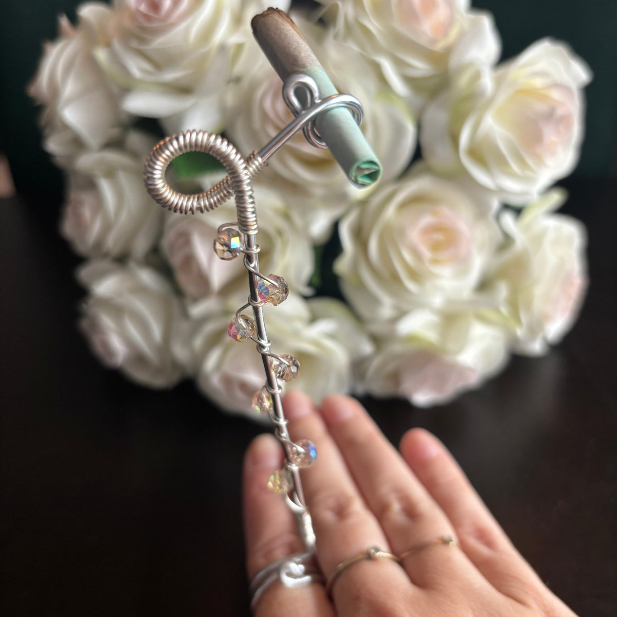Elegant joint holder smoking accessory with delicate acrylic beading and adjustable ring and joint clasp