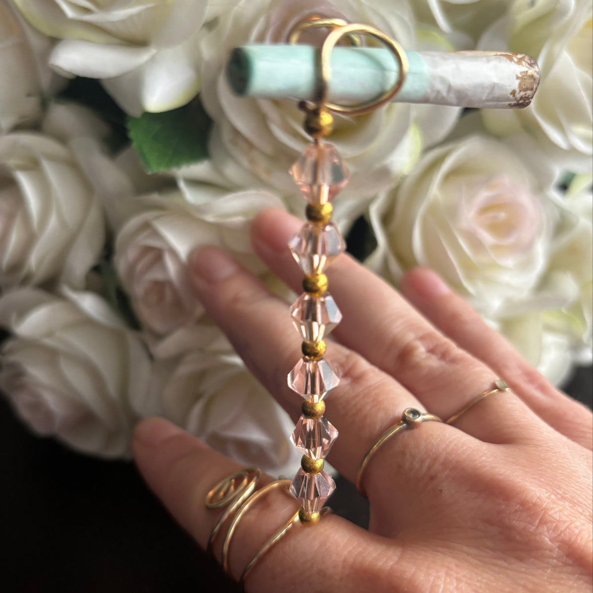 Elegant joint holder smoking accessory with delicate acrylic beading and adjustable ring and joint clasp