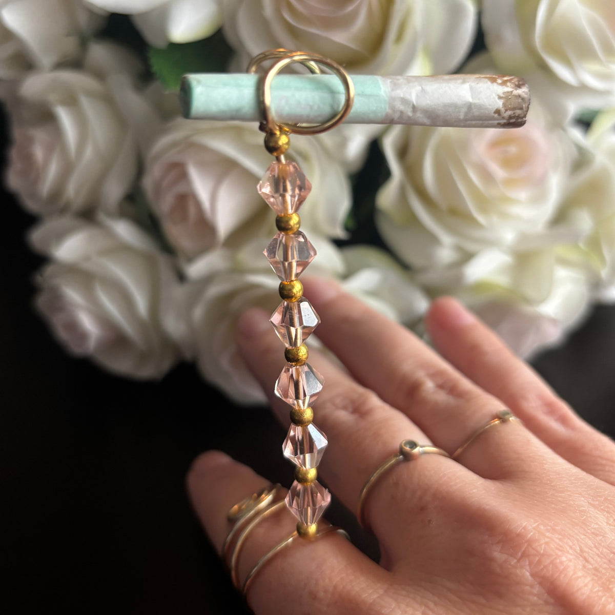 Elegant joint holder smoking accessory with delicate acrylic beading and adjustable ring and joint clasp