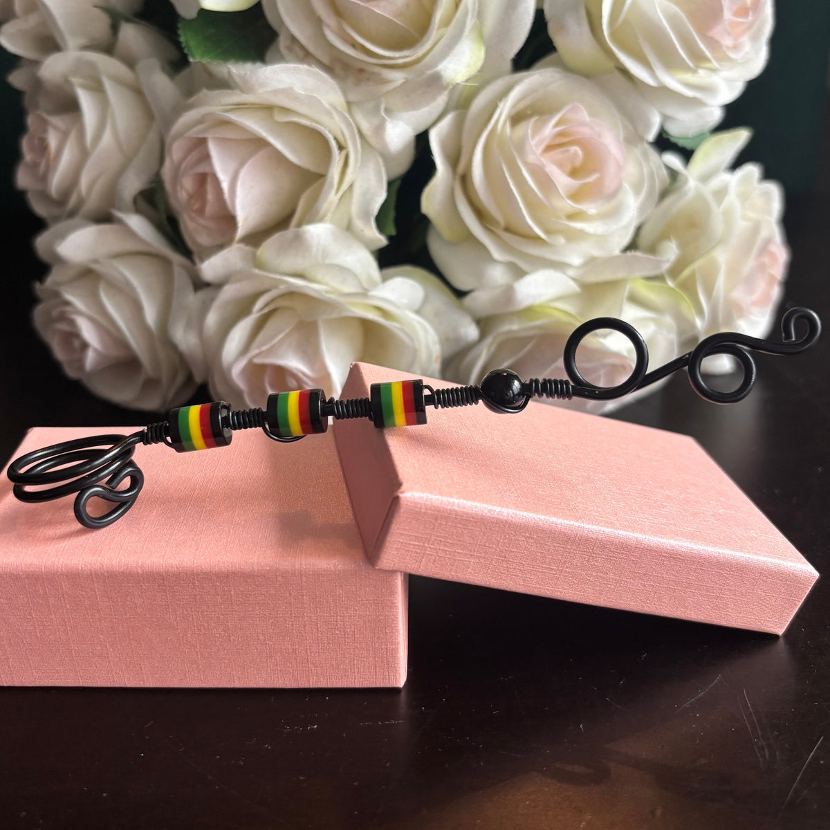Elegant joint holder smoking accessory with delicate acrylic beading and adjustable ring and joint clasp