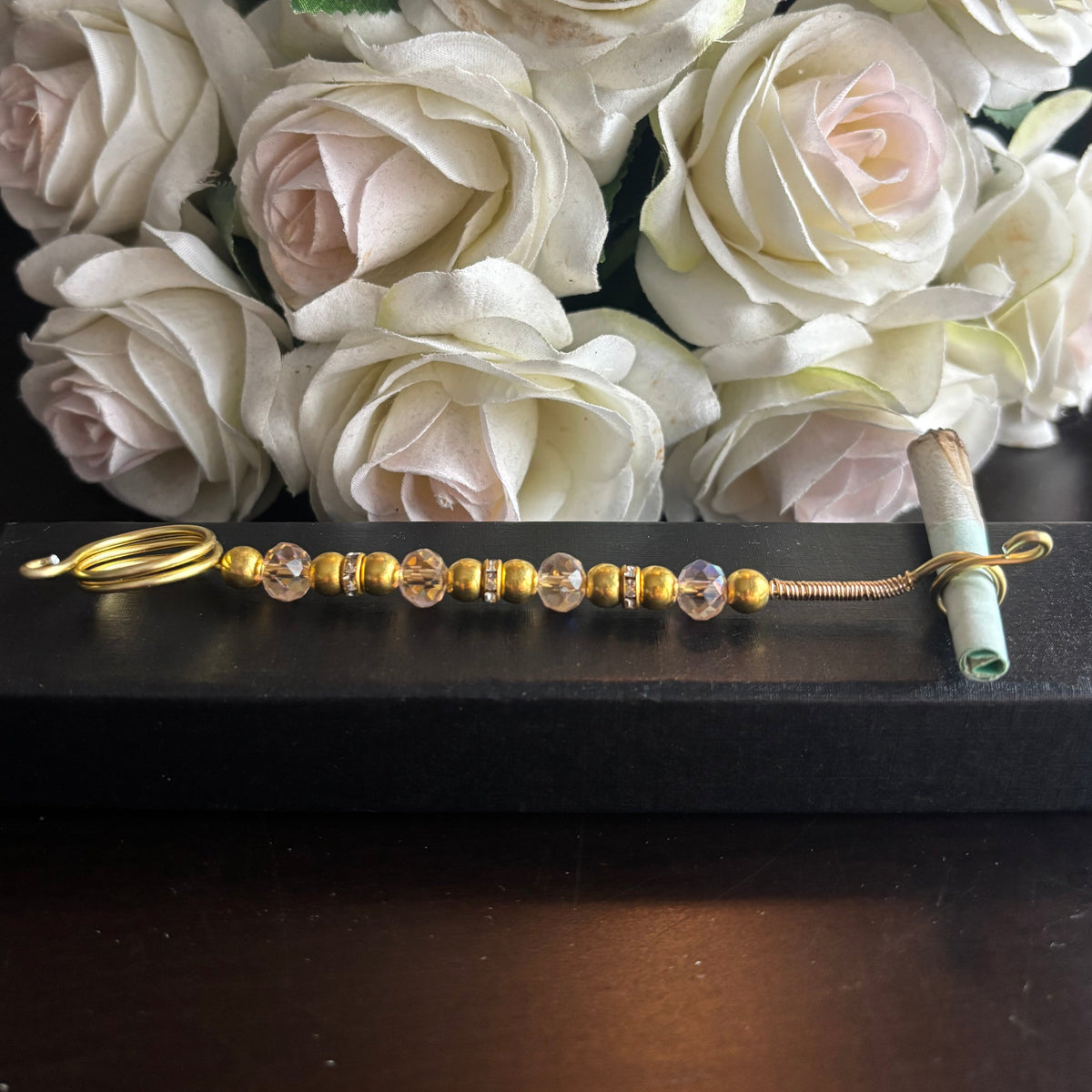 Elegant joint holder smoking accessory with delicate acrylic beading and adjustable ring and joint clasp