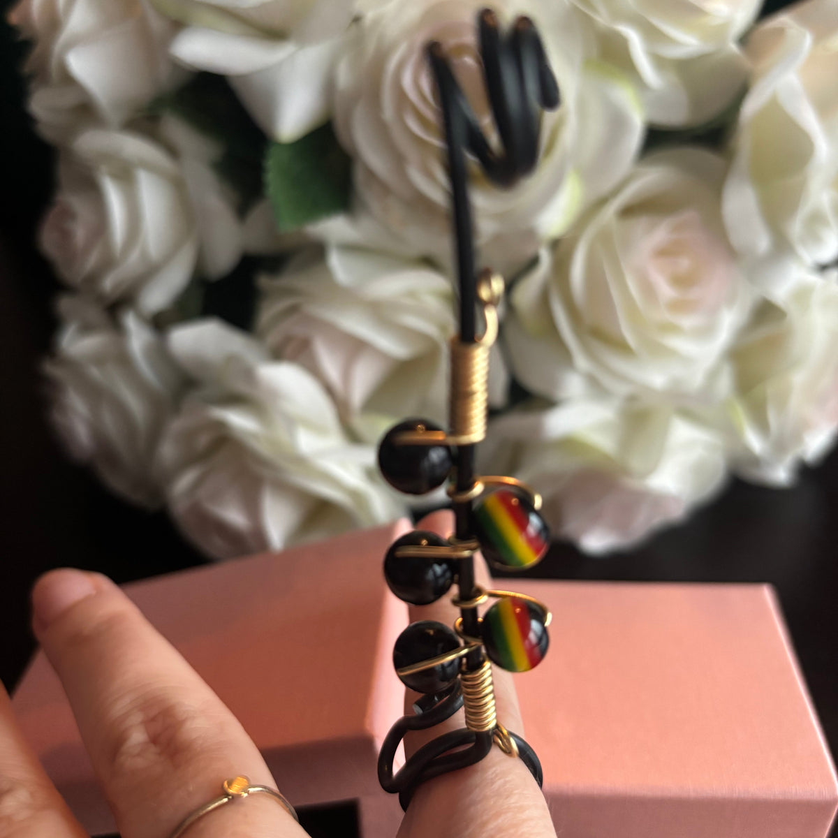 Elegant joint holder smoking accessory with delicate acrylic beading and adjustable ring and joint clasp