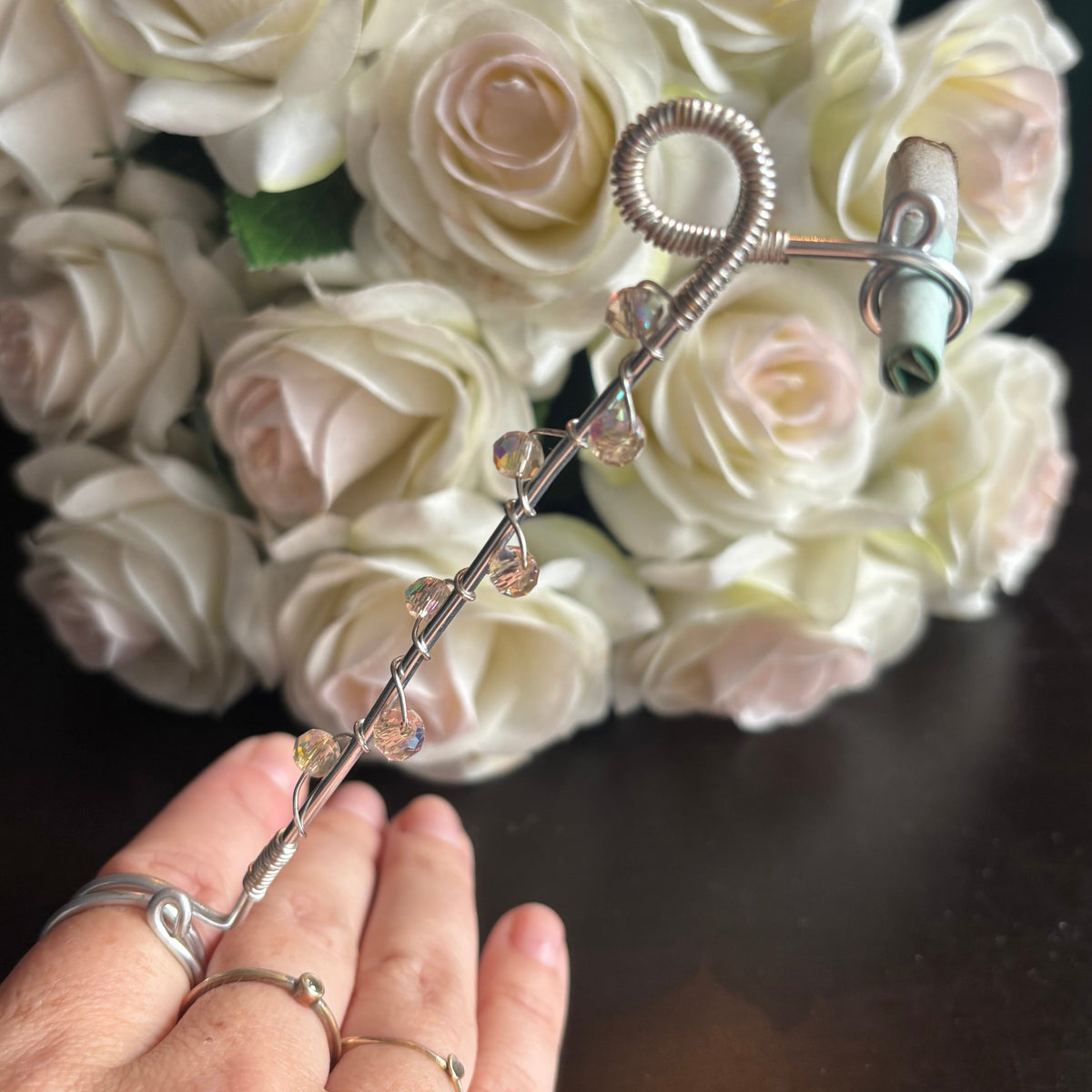 Elegant joint holder smoking accessory with delicate acrylic beading and adjustable ring and joint clasp