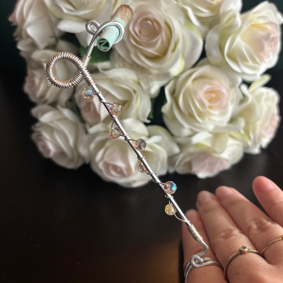 Elegant joint holder smoking accessory with delicate acrylic beading and adjustable ring and joint clasp