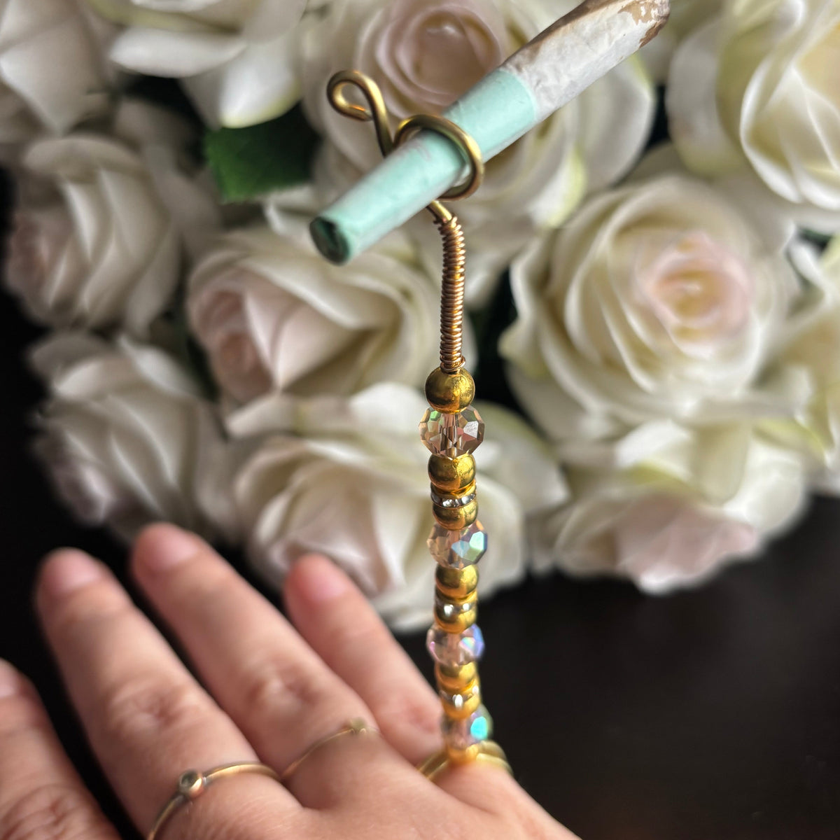 Elegant joint holder smoking accessory with delicate acrylic beading and adjustable ring and joint clasp