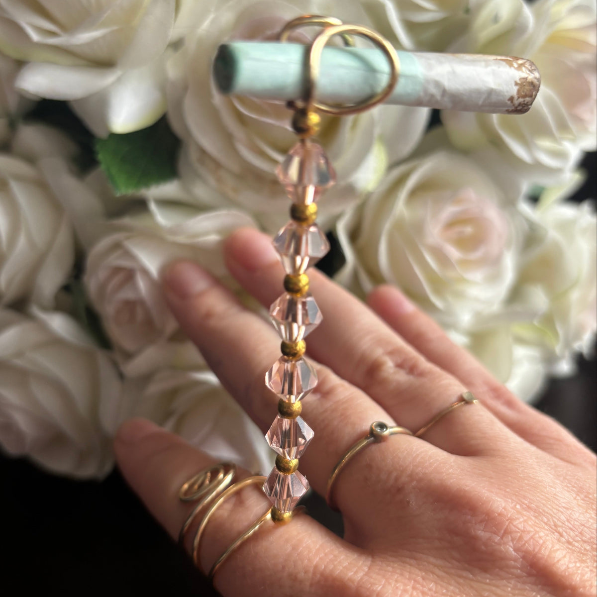 Elegant joint holder smoking accessory with delicate acrylic beading and adjustable ring and joint clasp