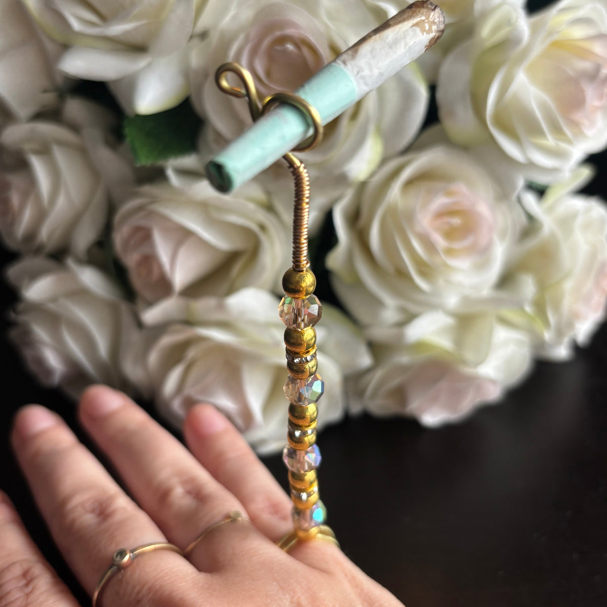 Elegant joint holder smoking accessory with delicate acrylic beading and adjustable ring and joint clasp