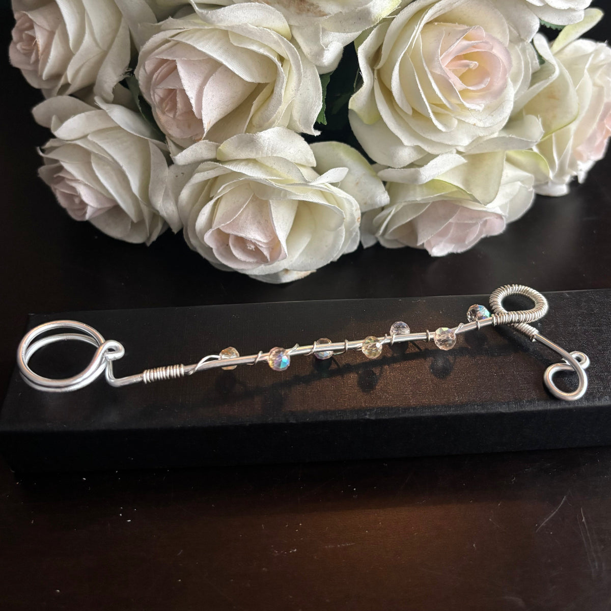Elegant joint holder smoking accessory with delicate acrylic beading and adjustable ring and joint clasp
